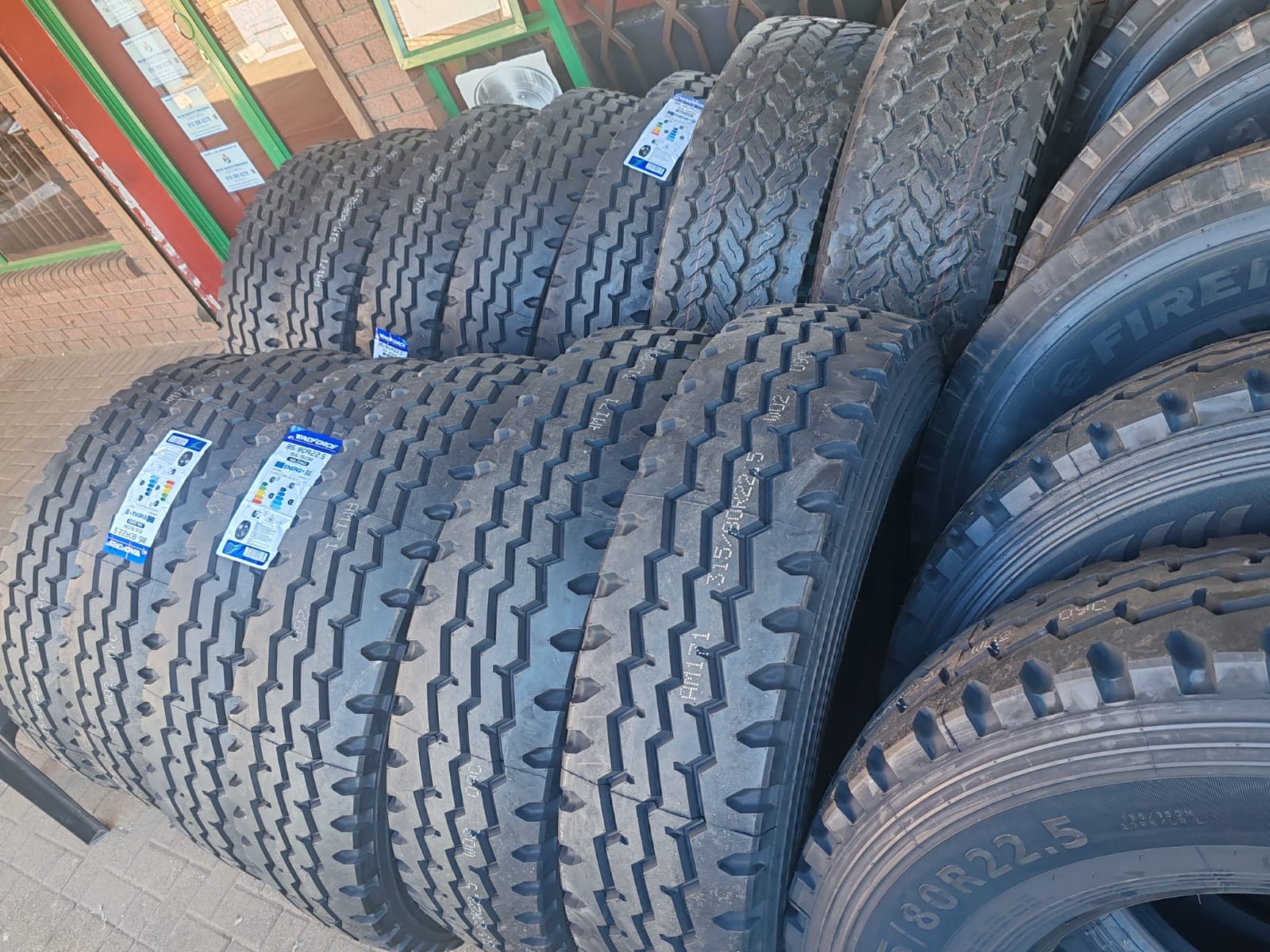 Warehouse stacked with commercial truck tyres